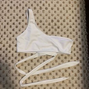 White one shoulder & the swim top. 🤎